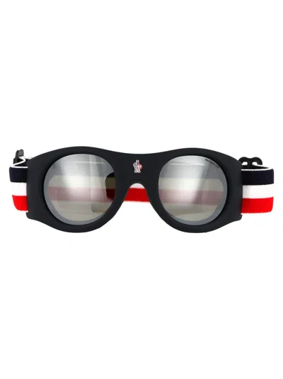 Shop Moncler Sunglasses In 92c Blu/monocolore