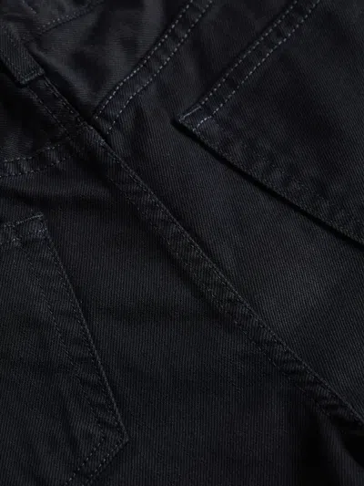 L Agence Clark Distressed Denim Short In Noir Destruct