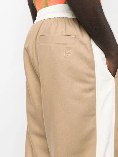 Shop Jw Anderson Colour-block Tapered Track Pants