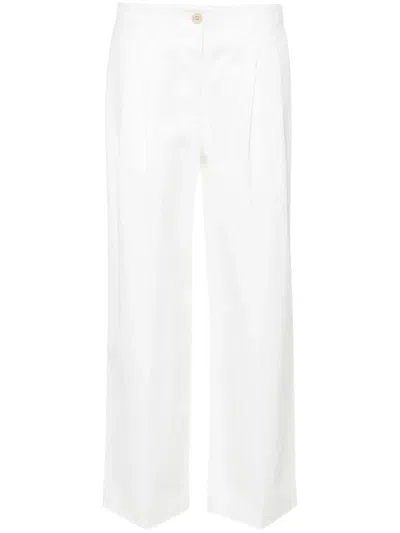 Shop Totême Pants In White
