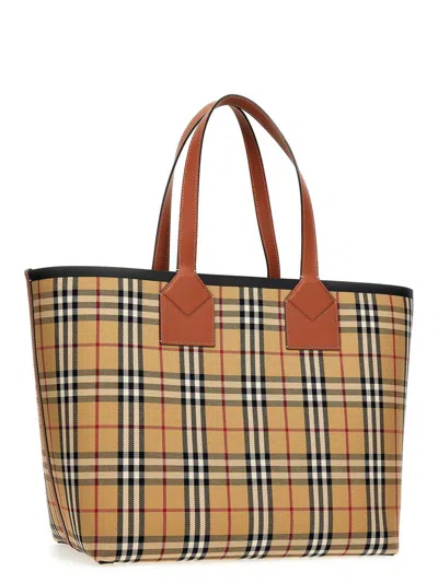 Shop Burberry 'london' Shopping Bag In Brown