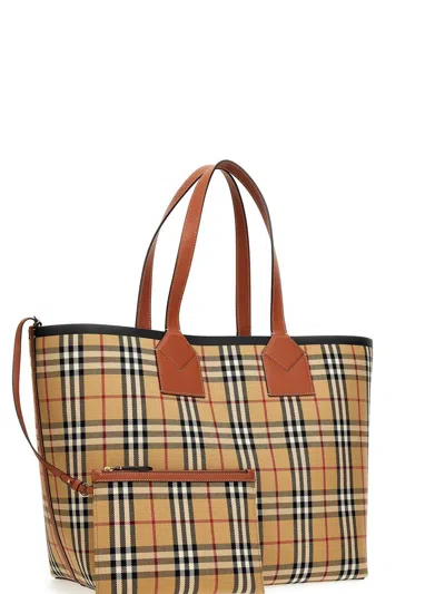 Shop Burberry 'london' Shopping Bag In Brown