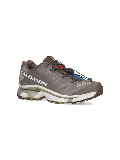 Shop Salomon Sneakers In Brown