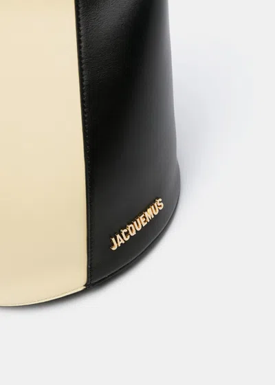 Shop Jacquemus Yellow/black Le Petit Tourni Bucket Bag In Pale Yellow/black