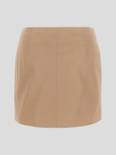 Shop Burberry Double-button Mini Skirt In Palenude