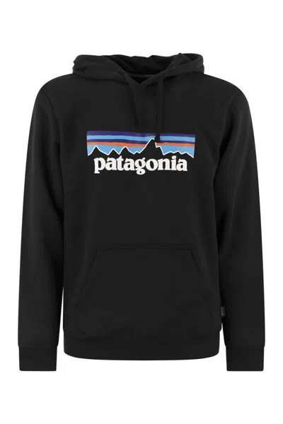 Shop Patagonia Cotton Blend Hoodie In Black