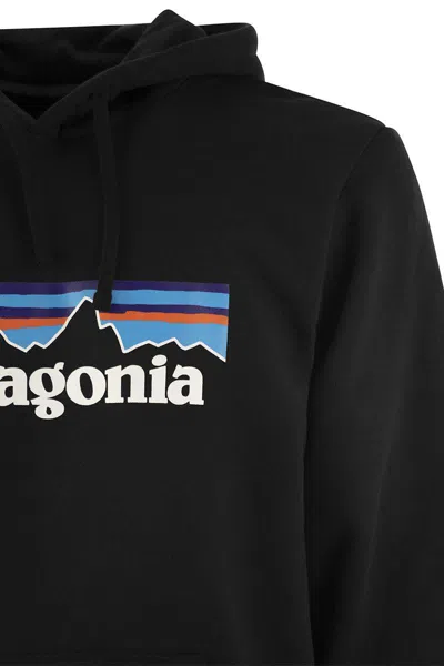 Shop Patagonia Cotton Blend Hoodie In Black