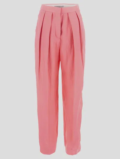 Shop Stella Mccartney Pleated Baggy Trousers In Hibiscus