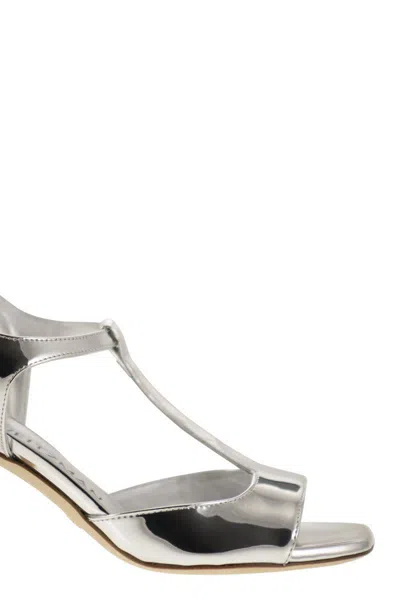Shop Stuart Weitzman Flareblock - Mirrored Leather T-sandal In Silver