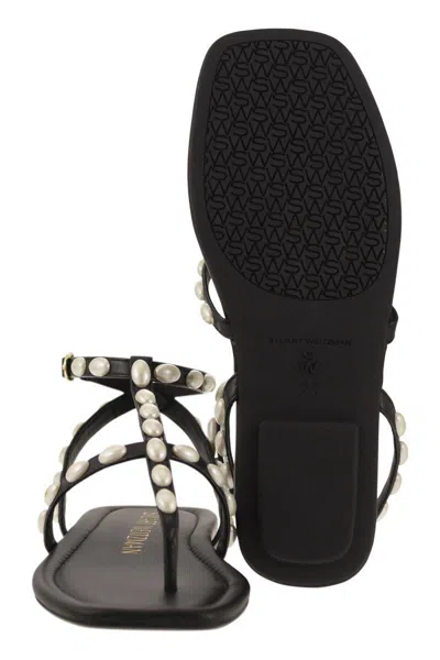 Shop Stuart Weitzman Pearlita - Thong Sandal With Pearls In Black