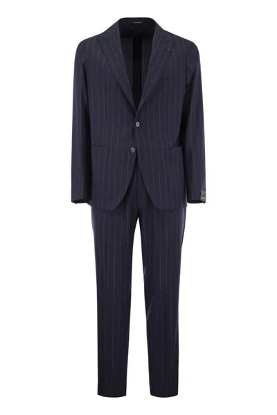 Shop Tagliatore Pinstripe Suit In Wool And Silk In Blue