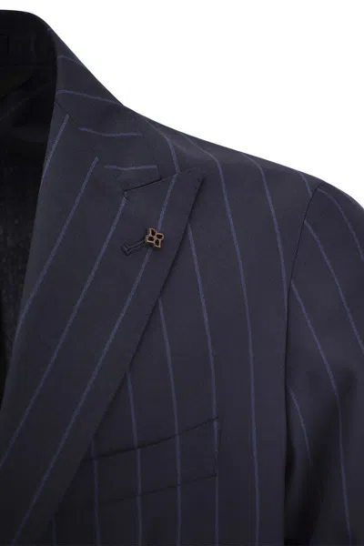 Shop Tagliatore Pinstripe Suit In Wool And Silk In Blue