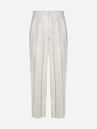 Shop Issey Miyake Pleated Trousers In Shell Beige
