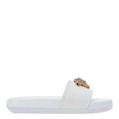 Shop Versace Sandals In White