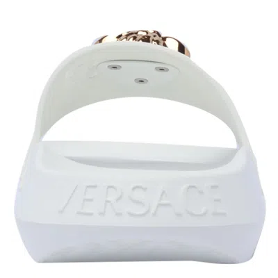 Shop Versace Sandals In White