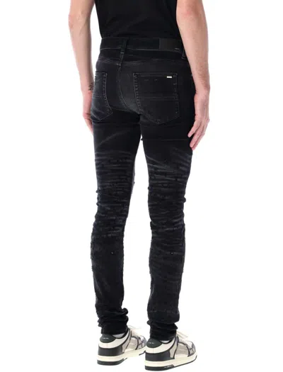Shop Amiri Shotgun Skinny Jeans In Faded Black