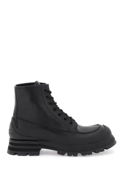 Shop Alexander Mcqueen Leather Ankle Boots In Nero