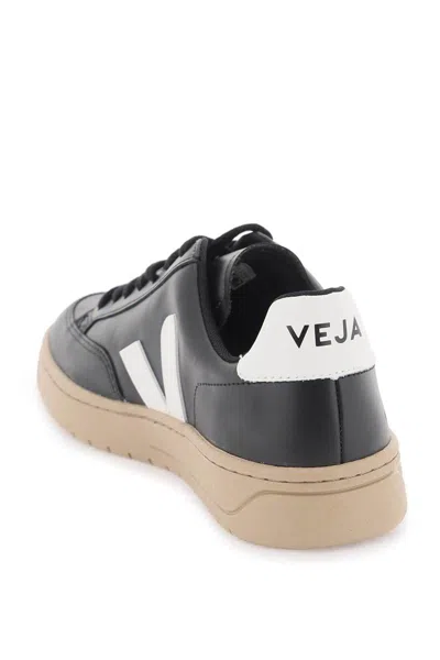 Shop Veja Leather V-12 Sneakers In Nero