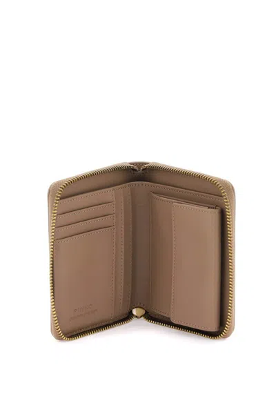 Shop Pinko Leather Zip-around Wallet In Beige