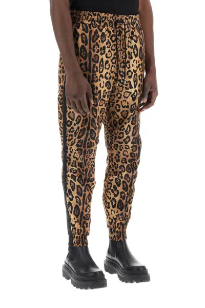 Shop Dolce & Gabbana Leopard Print Nylon Jogger Pants For In Beige