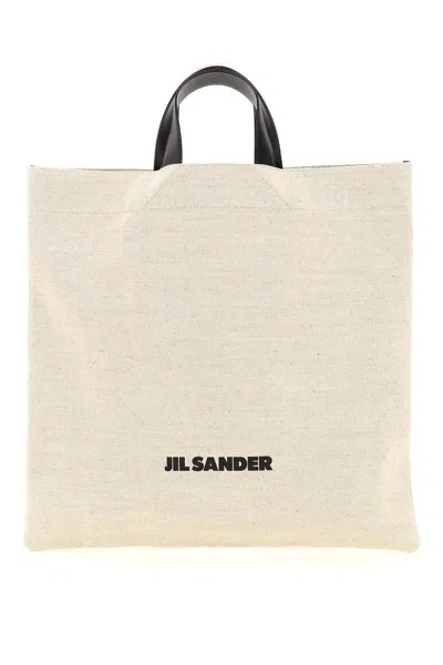 Shop Jil Sander Logoed Tote Bag In Beige