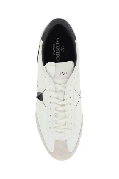 Shop Valentino Low Top Stud Around Sneakers In Bianco