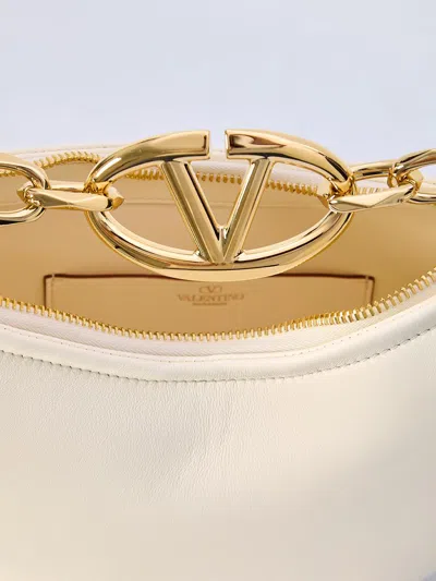 Shop Valentino Mini Hobo Vlogo Moon Bag In Ivory