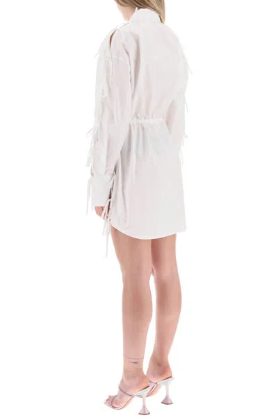 Shop Msgm Mini Shirt Dress With Cut-outs And Bows In Bianco