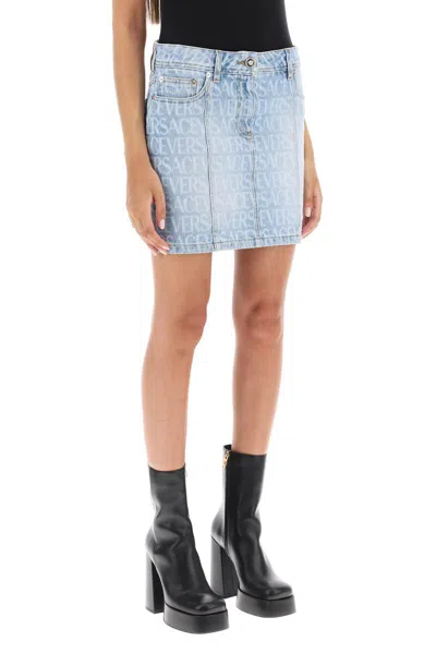 Shop Versace Monogram Denim Mini Skirt In Blu