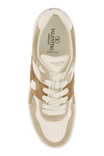 Shop Valentino One Stud Crust And Nappa Leather Sneakers In Bianco