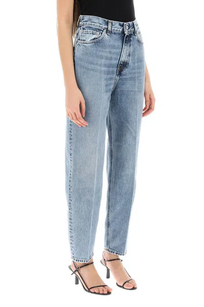 Shop Totême Organic Denim Tapered Jeans In Blu
