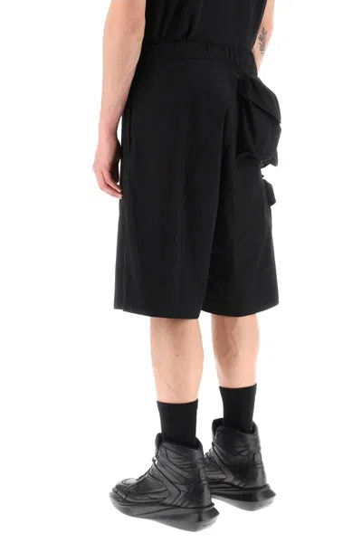 Shop Oamc Oversized Shorts With Maxi Pockets In Nero