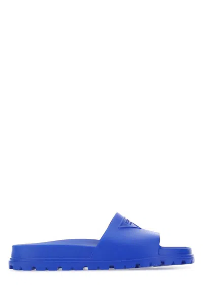 Shop Prada Slippers In Blue