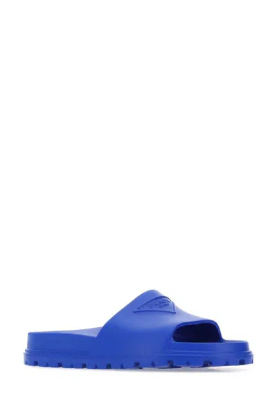 Shop Prada Slippers In Blue