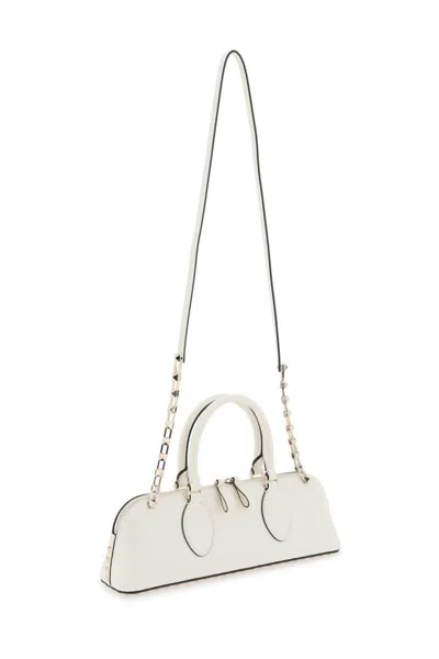 Shop Valentino Rockstud E/w Leather Handbag In Bianco