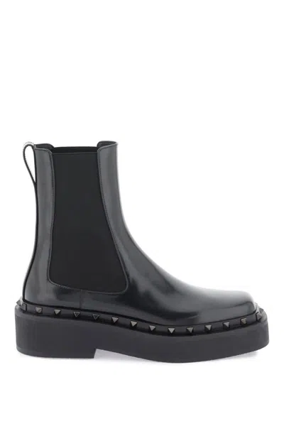 Shop Valentino Rockstud M-way Leather Beatle Boots In Nero