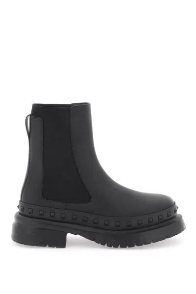 Shop Valentino Rockstud M-way Ankle Boots In Nero