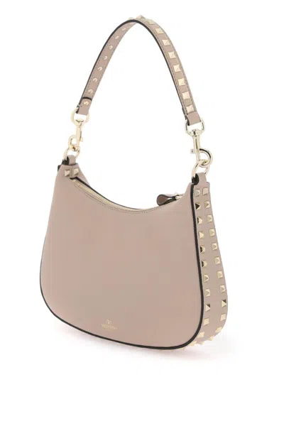 Shop Valentino Rockstud Small Hobo Bag In Rosa