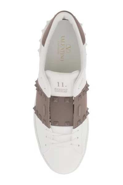 Shop Valentino Rockstud Untitled Sneakers In Bianco
