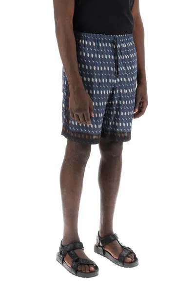 Shop Dries Van Noten S-wave Printed Bermuda Shorts In Blu