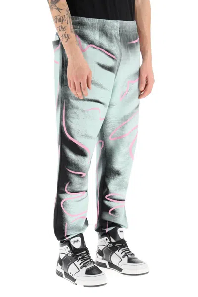 Shop Moschino Shadows & Squiggles Jogger Pants In Celeste