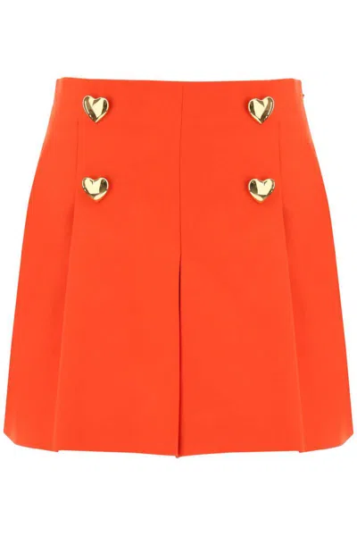 Shop Moschino Shorts With Heartshaped Buttons In Rosso
