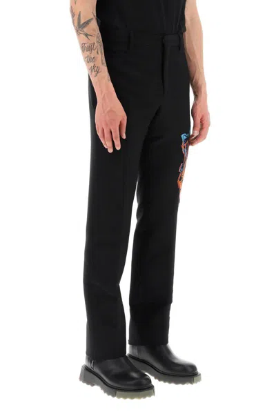Shop Off-white Slim Pants With Graffiti Patch In Nero