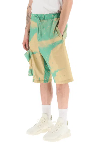 Shop Oamc Smudge Oversized Shorts With Maxi Pockets In Verde