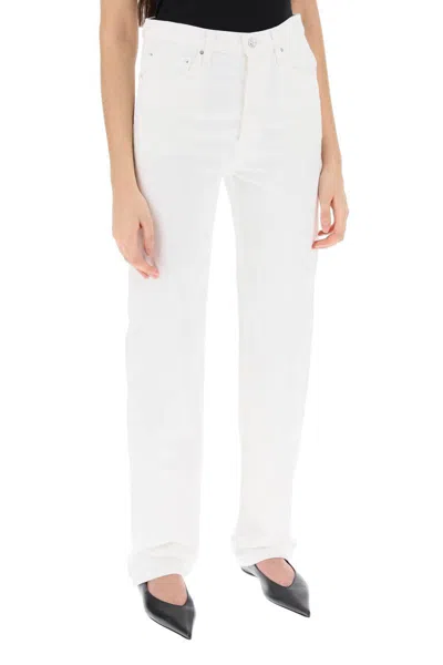 Shop Totême Straight Cut Loose Jeans In Bianco