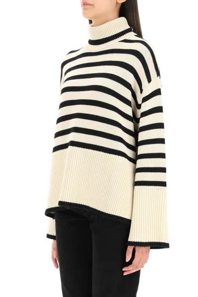 Shop Totême Striped Wool Cotton Turtleneck In Beige