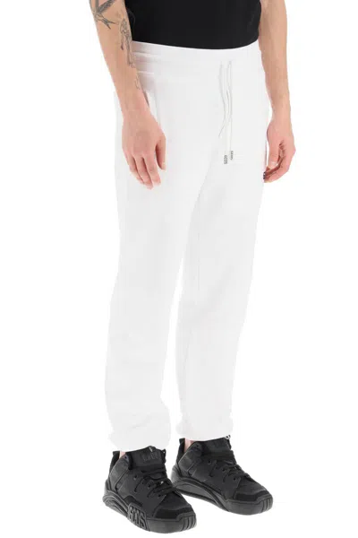 Shop Gcds Sweatpants With Logo Detail In Bianco
