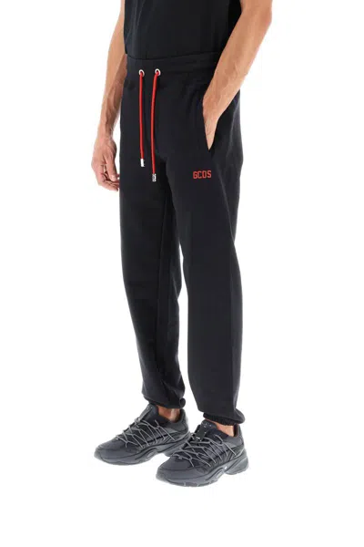 Shop Gcds Sweatpants With Logo Detail In Nero