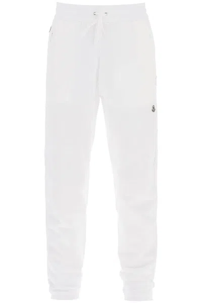 Shop Moncler Genius Tapered Cotton Sweatpants In Bianco
