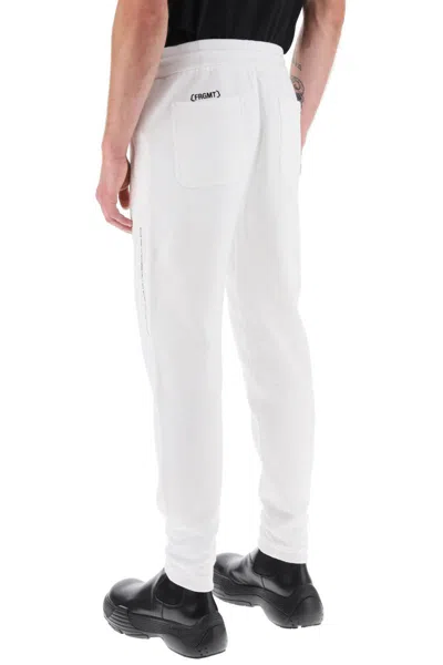Shop Moncler Genius Tapered Cotton Sweatpants In Bianco